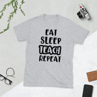 Eat Sleep Teach Repeat Softstyle Unisex Tee